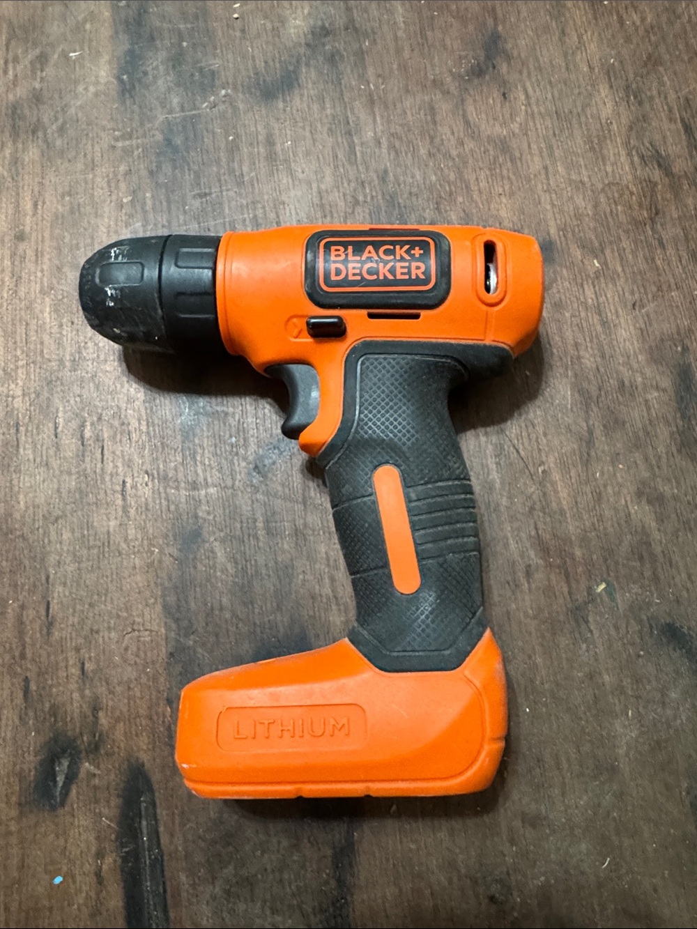 GUC Black & Decker Orange and Black Cordless Drill Driver. Needs charging cord.
